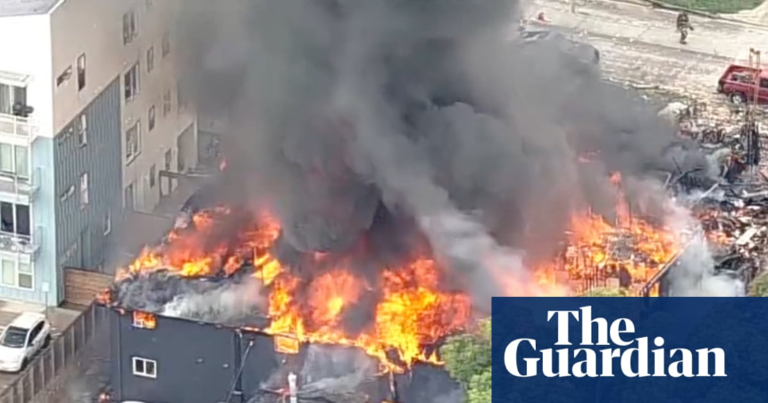 Dallas rescuers search for victims after gas explosion destroys building and ignites blaze – The Guardian