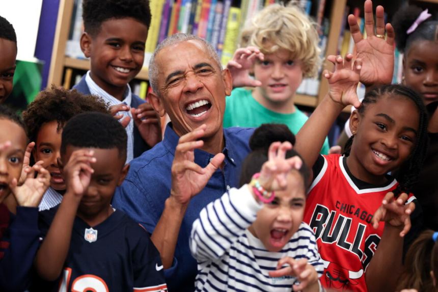 Barack and Michelle Obama surprise first visitors to newly opened presidential center – AP News