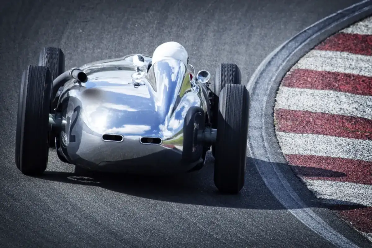 Racing car cornering on a track, illustrating Antonelli Austin pole F1 story