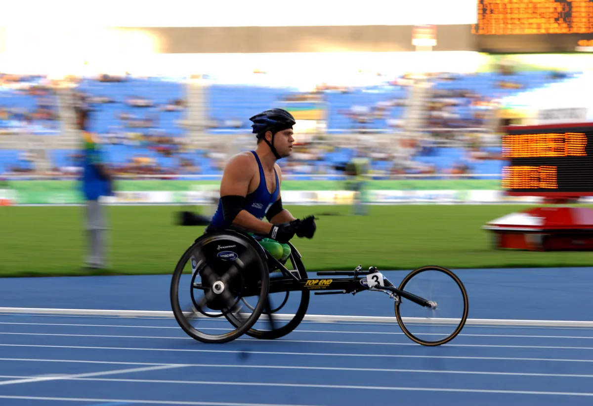 Wheelchair racer on an athletics track, illustrating Asian Para Games 2026