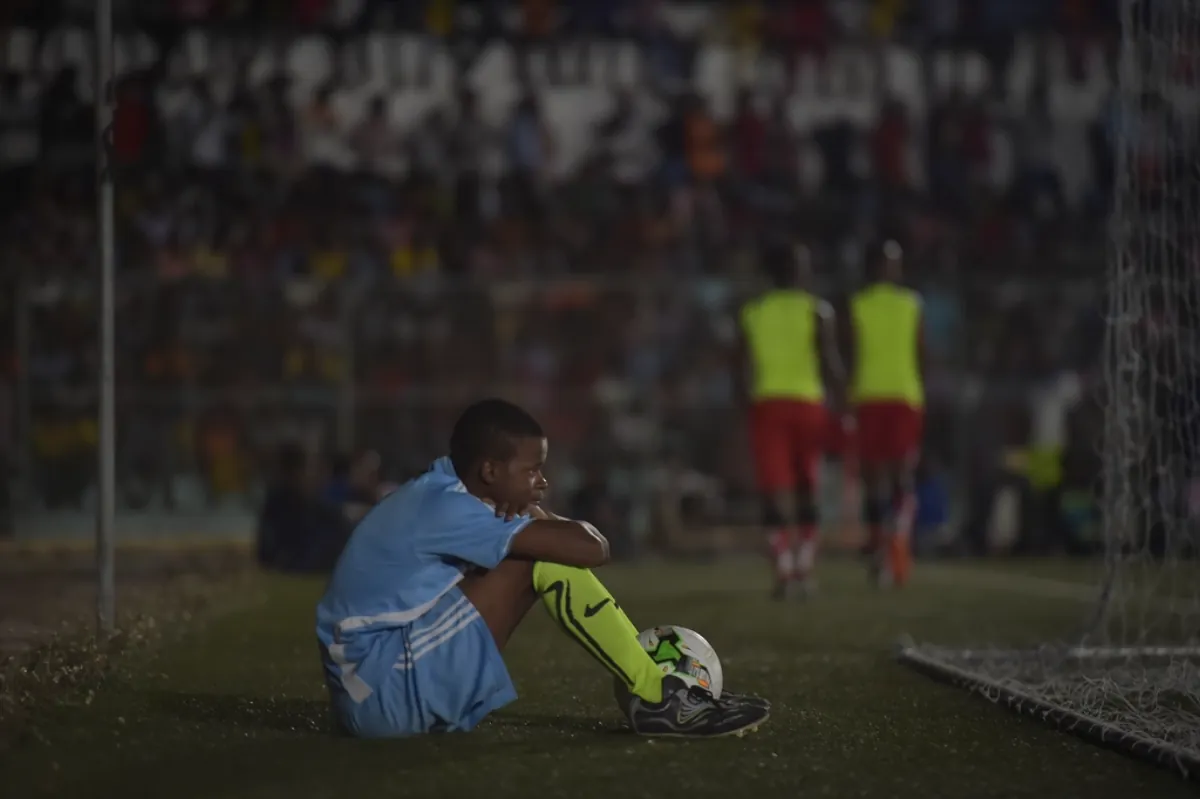 Football resting near a goal net, illustrating El Clasico Mbappe brace win