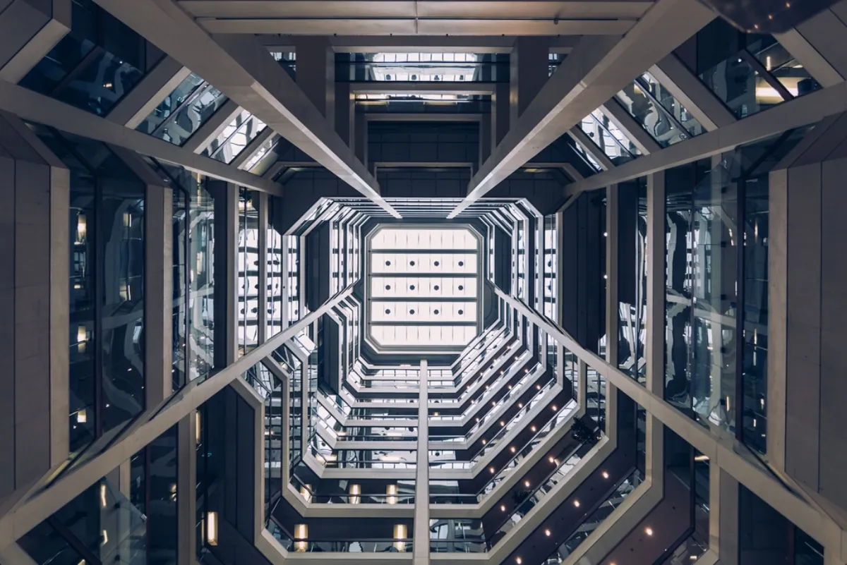 Modern glass and steel building interior, illustrating the RBI data centre in Odisha
