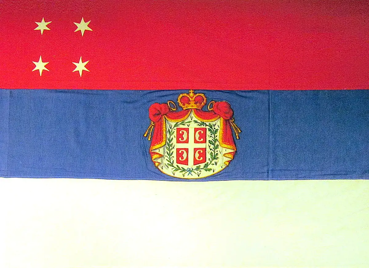 Historic red, blue and white Serbian flag with coat of arms, illustrating Serbia election results